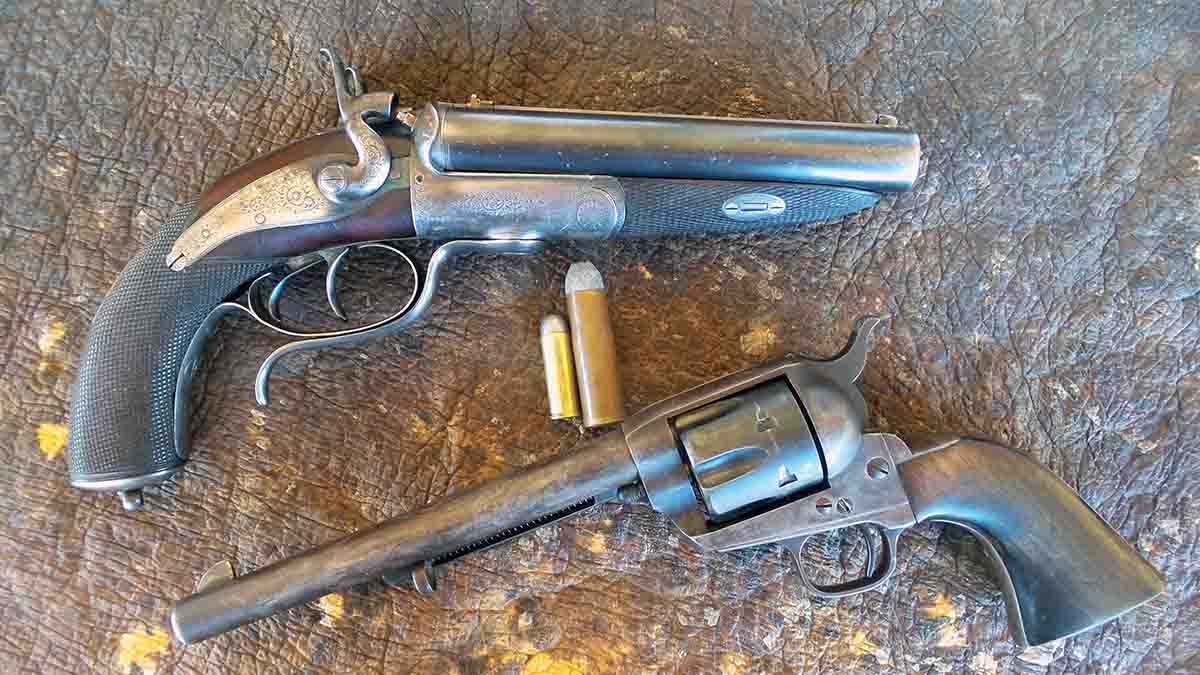 .577 Snider howdah pistol by Joseph Lang shown with a 1873 Colt Single Action Army revolver. The hippopotamus hide on which the .577 howdah was photographed was taken by the author in Tanzania in 2006, but was not shot with a howdah pistol!